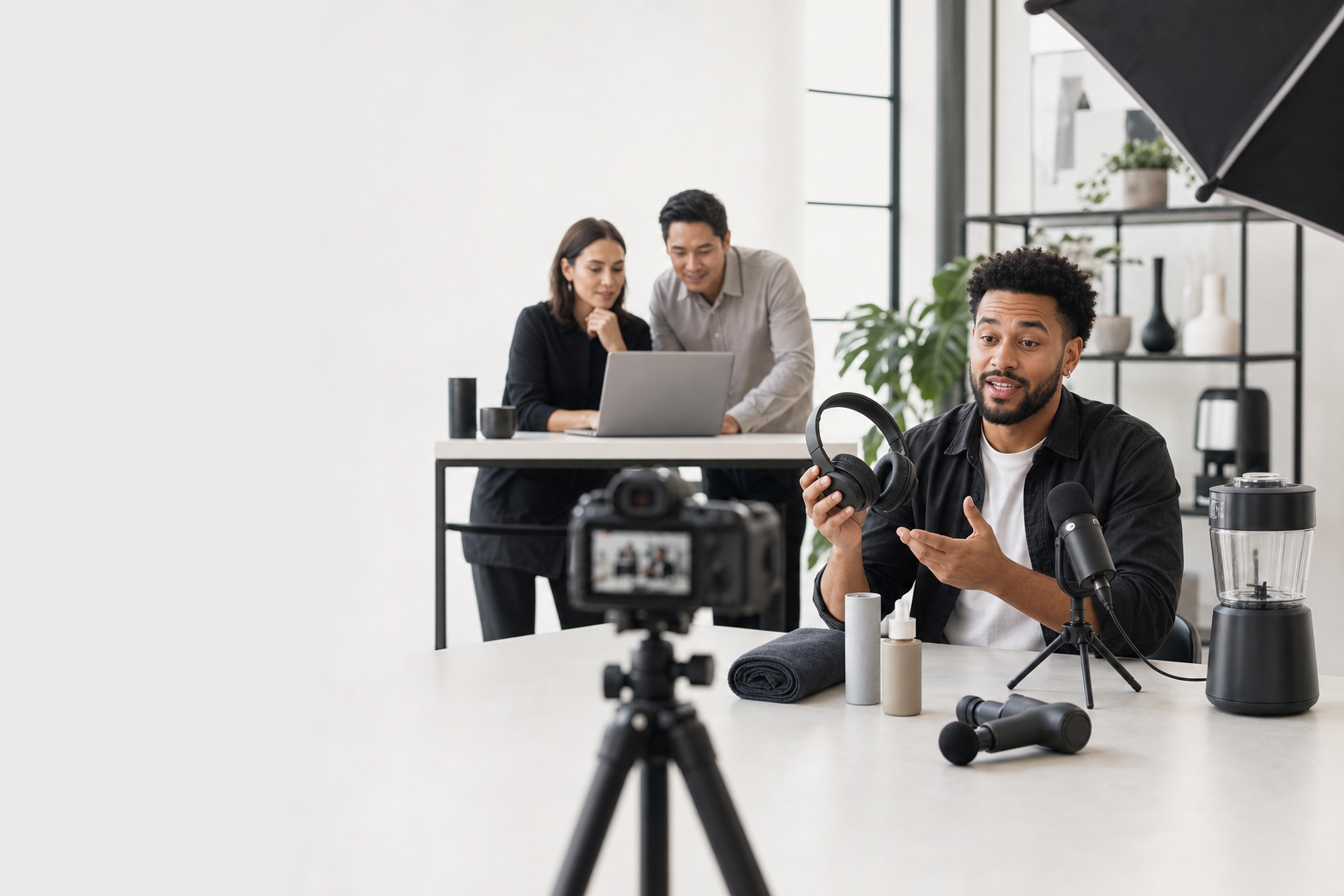 YouTube creator filming a product review while a brand team collaborates nearby